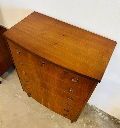 Teak chest of drawers with curved front