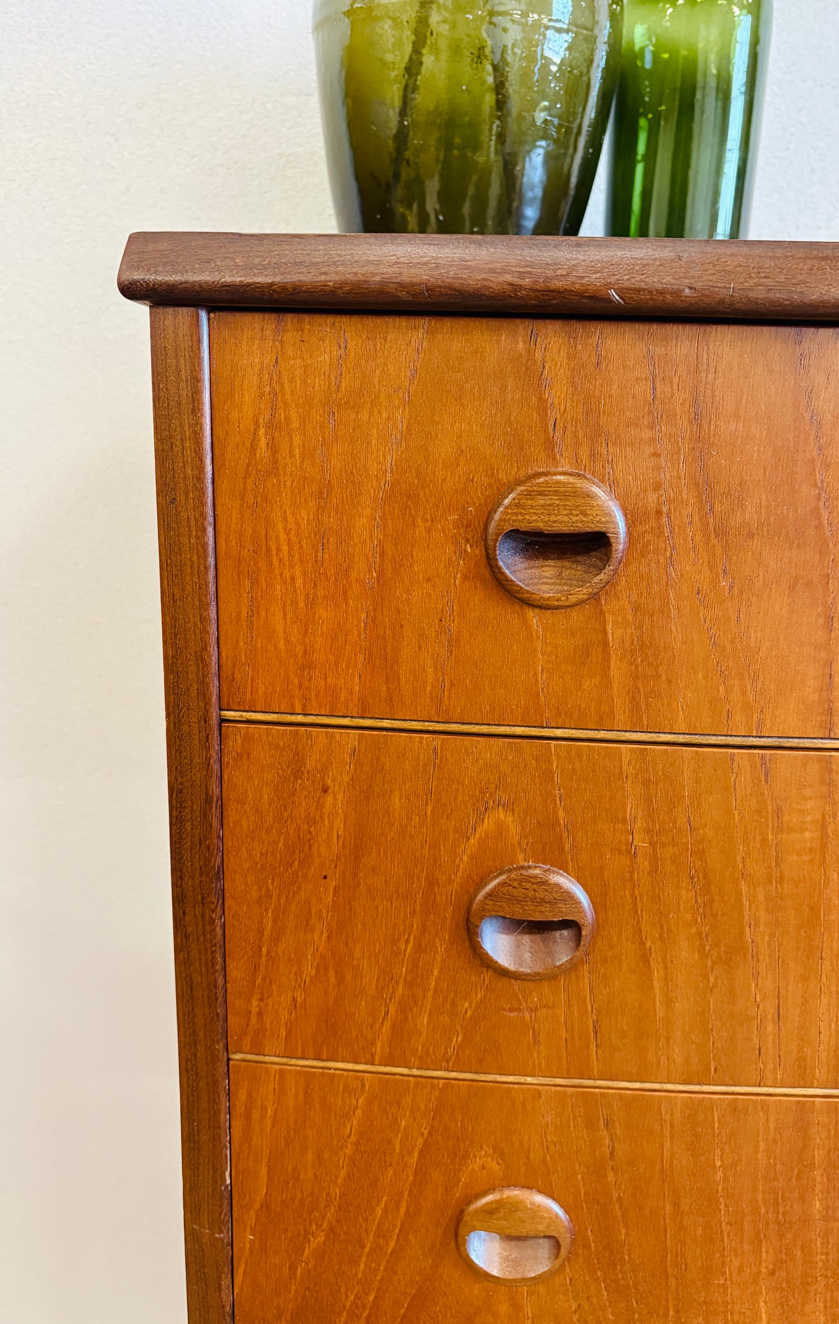 Teak chest of drawers with curved front
