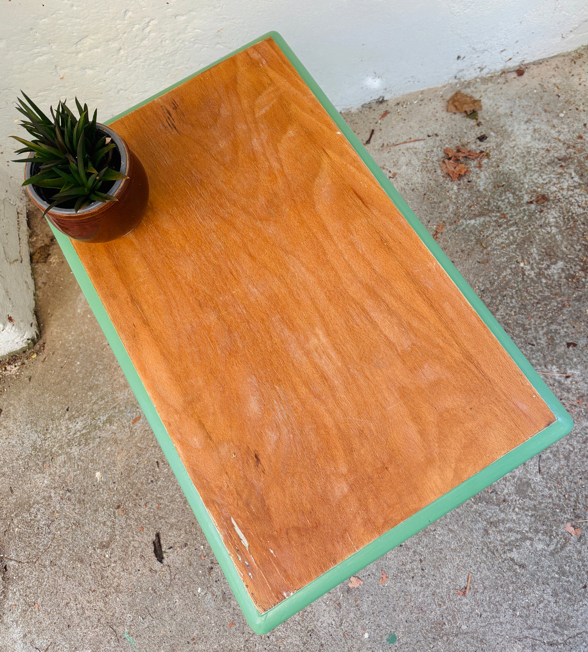 Small side table with green frame