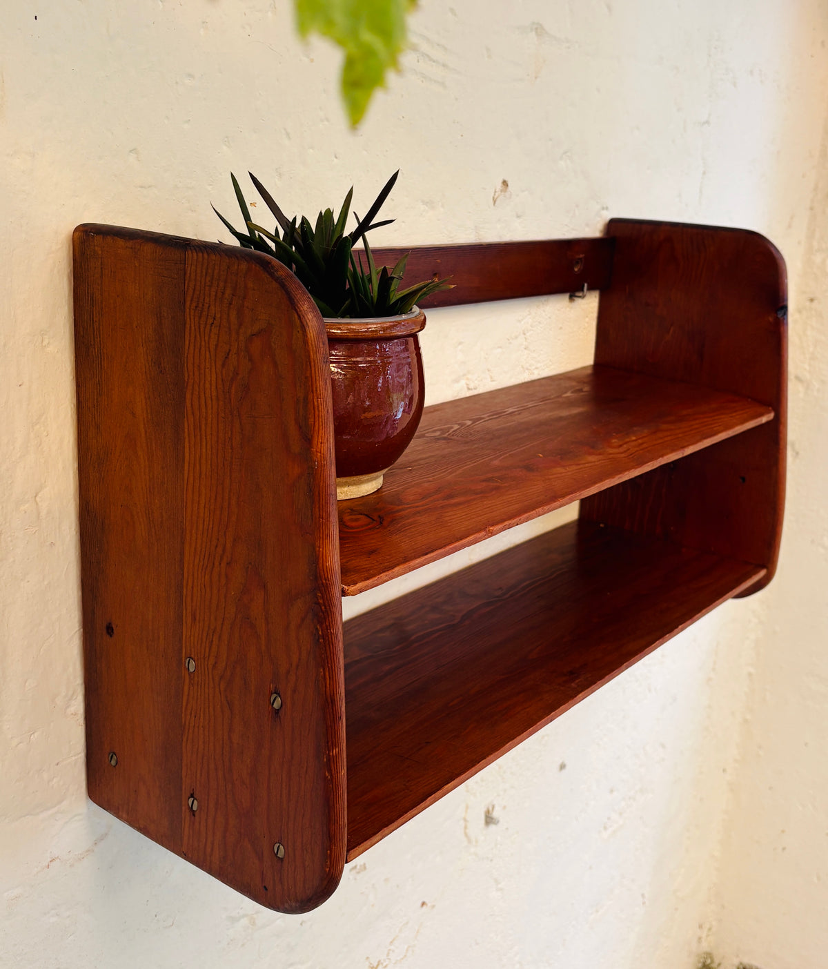 Wall-mounted shelf