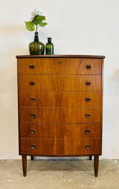 Teak chest of drawers with curved front