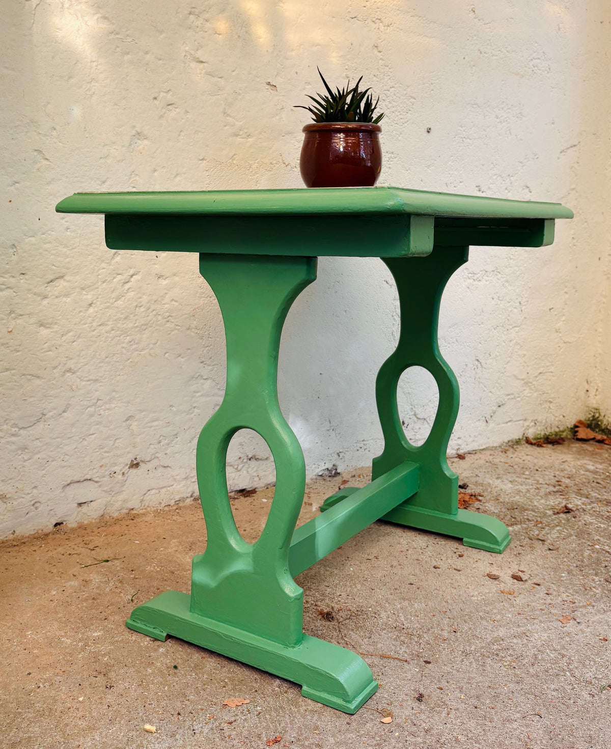 Small side table with green frame