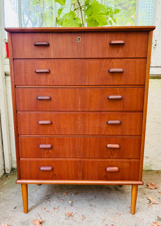 Tall teak chest of drawers with six drawers and solid handles